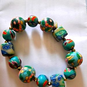 Alexa's Angels hand painted floral and feather bracelet